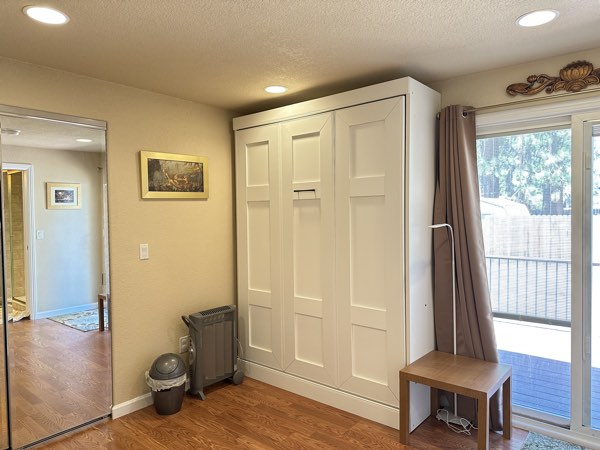 Bedroom with the Murphy bed folded away